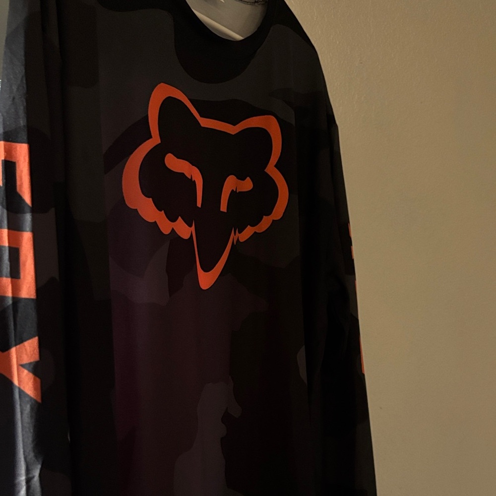 Fox Black and Orange Camo Long Sleeve motocross jersey.